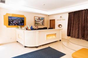 TV a/nebo společenská místnost v ubytování Hotel Dafi