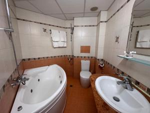 Koupelna v ubytování Hotel Dafi
