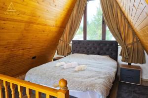 Postel nebo postele na pokoji v ubytování Weekend house - Vlašić