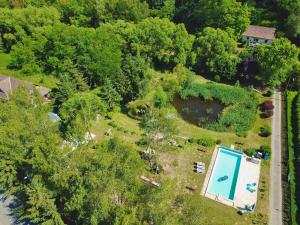 an aerial view of a yard with a swimming pool at Palócliget Vendégház in Kétbodony