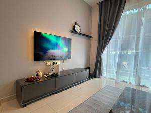 Μια τηλεόραση ή/και κέντρο ψυχαγωγίας στο HM Dream D'Carlton GAME Mahjong up to 6paxs