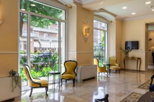 TV a/nebo společenská místnost v ubytování Boutique Hotel Heritage