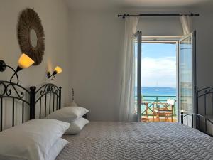 Voodi või voodid majutusasutuse Brazzera Hotel toas