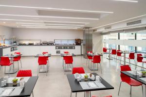 Reštaurácia alebo iné gastronomické zariadenie v ubytovaní Eurostars Central