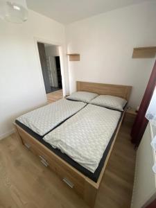 a bedroom with a bed in a room at City Flat - Garage parking - TRITA SK in Poprad