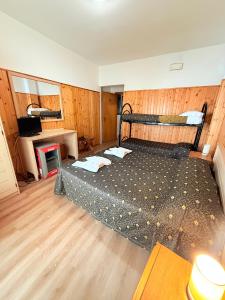 Letto o letti in una camera di Hotel Archimede Ortigia