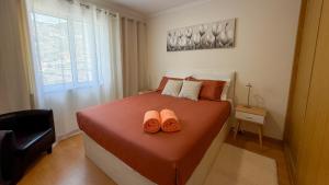 Postel nebo postele na pokoji v ubytování Refúgio na Quinta Girassol + 7 fotografií