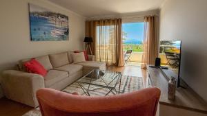 TV a/nebo společenská místnost v ubytování Refúgio na Quinta Girassol