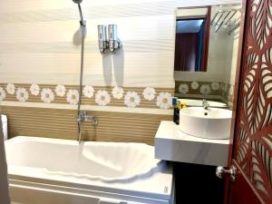 Koupelna v ubytování Kim Ngoc Khanh Hotel