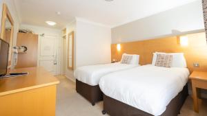 Cama o camas de una habitación en The Kenmare Bay Hotel & Luxury Lodges Resort