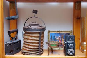 a shelf with various items on top at Kerveli Luxury Villa in Kerveli