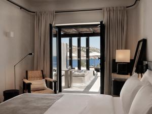 Postel nebo postele na pokoji v ubytování Kalesma Mykonos + 37 fotografií