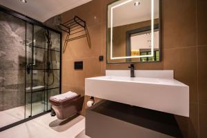 Koupelna v ubytování Eco Villa AURA 4 + 18 fotografií