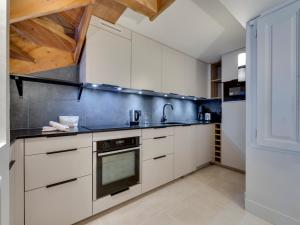 Kuchnia lub aneks kuchenny w obiekcie Duplex confortable au cœur de Tignes Val Claret, 3 chambres, proche centre et navettes - FR-1-641-14