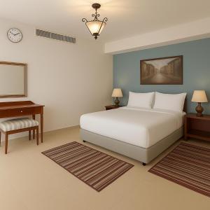 A bed or beds in a room at Marina Resort Port Ghalib, a member of Radisson Individuals