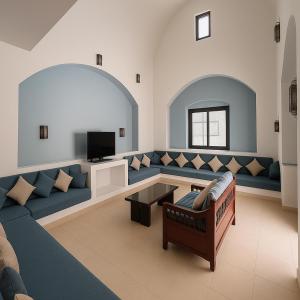 A television and/or entertainment centre at Marina Resort Port Ghalib, a member of Radisson Individuals
