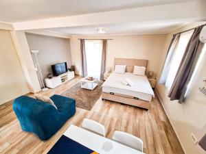 Ένα ή περισσότερα κρεβάτια σε δωμάτιο στο Apartmani Bradasevic Tivat****