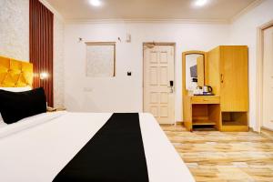 Postel nebo postele na pokoji v ubytování Super Hotel JP Palace