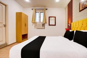 Postel nebo postele na pokoji v ubytování Super Hotel JP Palace