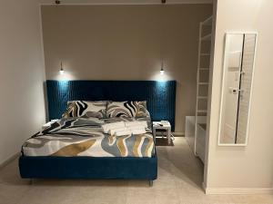 Ένα ή περισσότερα κρεβάτια σε δωμάτιο στο 365 Rooms