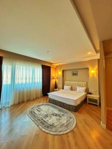 Postel nebo postele na pokoji v ubytování Park Dedeman Baku