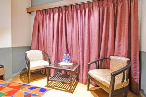 Posezení v ubytování FabHotel Gulshan International - Nr Peter Cat Park Street