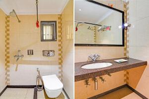 Koupelna v ubytování FabHotel Gulshan International - Nr Peter Cat Park Street