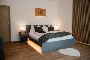 Postel nebo postele na pokoji v ubytování CLAUS RESCH APPARTEMENTS