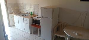 Kuchyň nebo kuchyňský kout v ubytování Poseidon room's Vourvourou + 10 fotografií