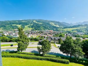 a view of a town from a hill at Alpenblick - klein, aber fein in Schladming
