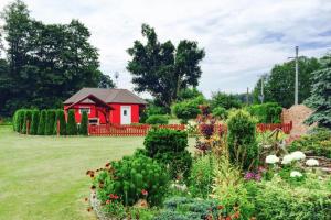 Vonkajšia záhrada v ubytovaní holiday home in Nowe Warpno