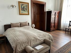 Postel nebo postele na pokoji v ubytování Rózsakert Vendégház