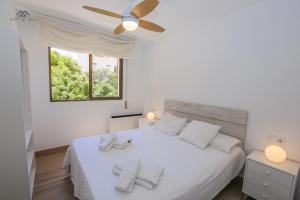 En eller flere senge i et værelse på La Caleta Sea views and Pool