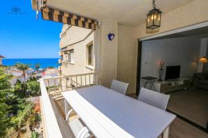 En balkon eller terrasse på La Caleta Sea views and Pool + 28 billeder
