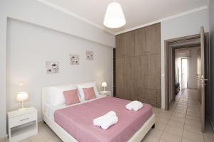 Postel nebo postele na pokoji v ubytování Casa di Kalomoira