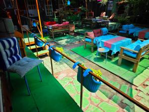 a group of chairs and a table and a table and chairs at Side Tuana Garden Home in Side