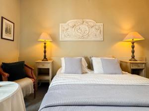 Postel nebo postele na pokoji v ubytování Hotel Botaniek