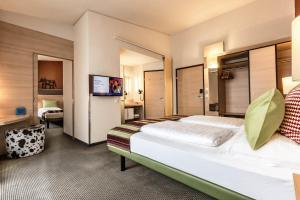 Letto o letti in una camera di TUI BLUE Schladming
