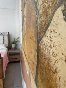 A bed or beds in a room at Ionian Nest