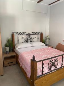 A bed or beds in a room at Ionian Nest