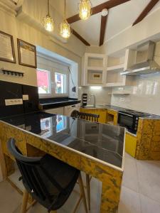 A kitchen or kitchenette at Ionian Nest