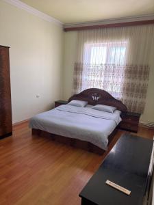 Postel nebo postele na pokoji v ubytování Дом для отпуска + 16 fotografií
