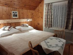 Postel nebo postele na pokoji v ubytování Ferienhaus zur Birke + 6 fotografií