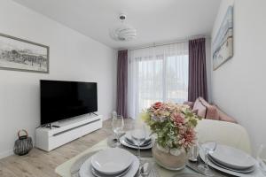 TV a/nebo společenská místnost v ubytování Balticus by Solarento
