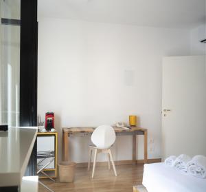Łóżko lub łóżka w pokoju w obiekcie Imago Plus Hotel