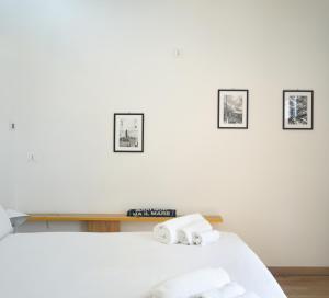 Łóżko lub łóżka w pokoju w obiekcie Imago Plus Hotel