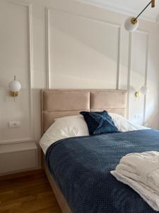 Ένα ή περισσότερα κρεβάτια σε δωμάτιο στο DILL apartman Arandjelovac +11 φωτογραφίες