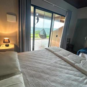 Postel nebo postele na pokoji v ubytování Pousada Fazenda Guartelá + 8 fotografií