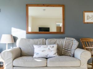 Posezení v ubytování Cow Pasture Cottage