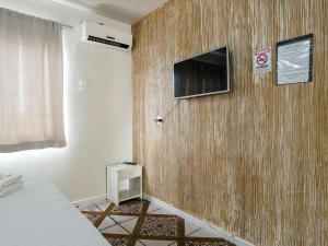 TV a/nebo společenská místnost v ubytování Hotel Colina
